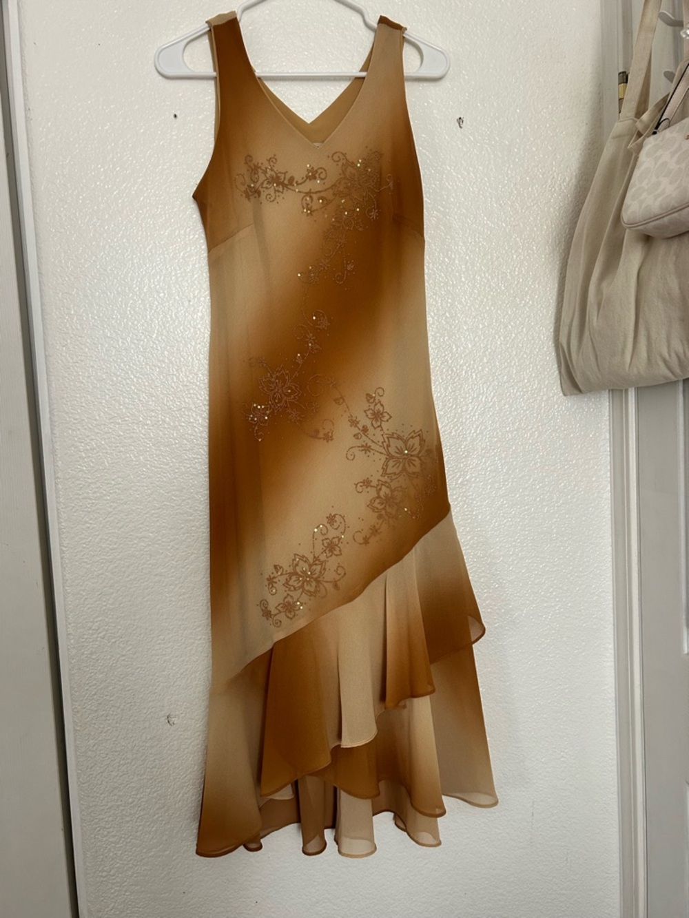 Sleeveless Brown Gradient High-Low Dress with Floral Detail